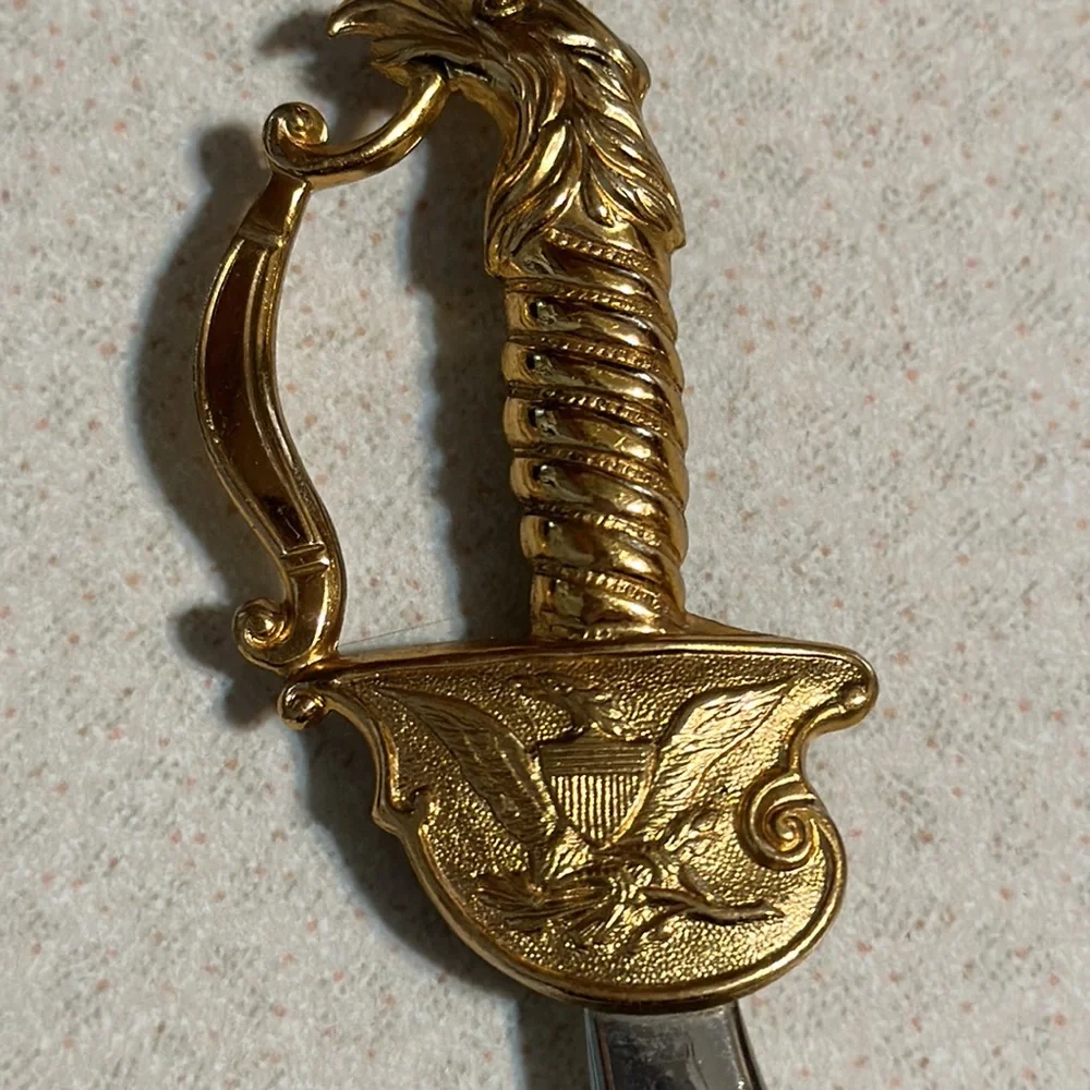 Coro gold tone and silver tone sword broach (541)